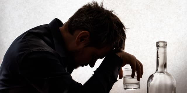 Alcohol Use Disorder (AUD): Symptoms, Causes, & Treatment